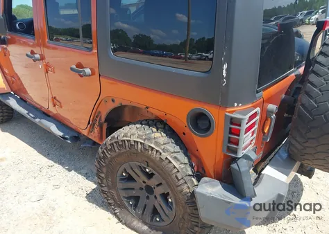 2011 Jeep Wrangler Unlimited Sahara из США, поврежденный, VIN 1J4BA5H15BL588327